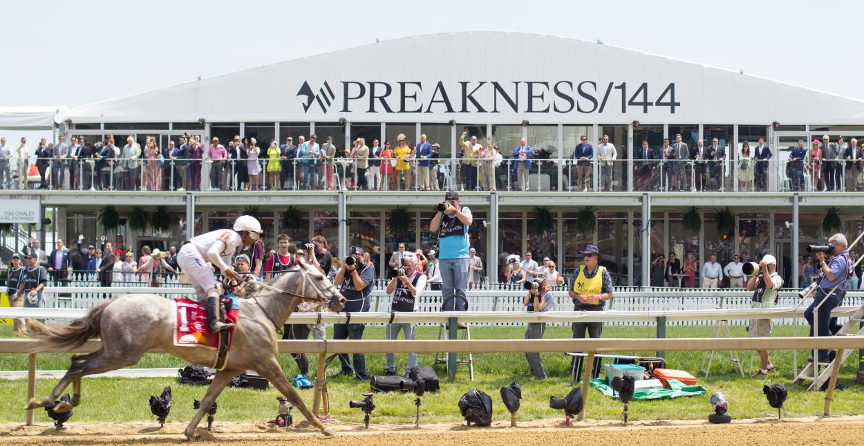 New York Central gallops past the Pimlico infield pavilion after winning the Maryland Sprint Stakes on May 18, 2019.