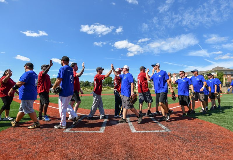 Softball teams shaking hands