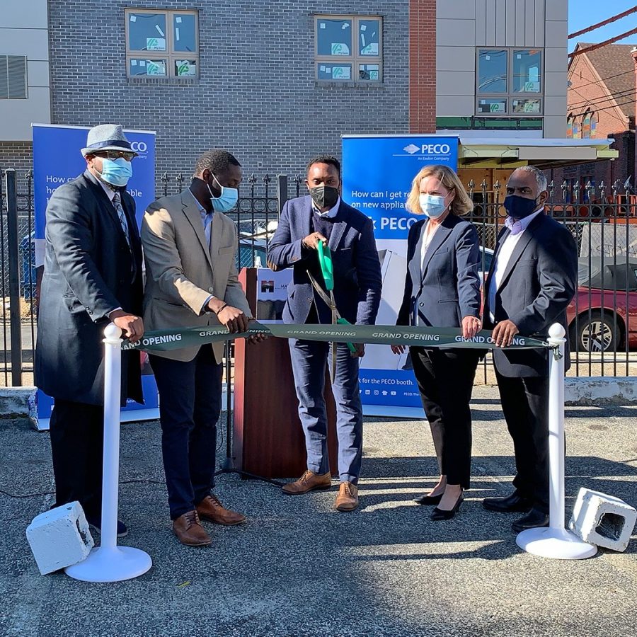 PECO executives cutting ribbon for new building