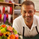 flower shop owner with flowers