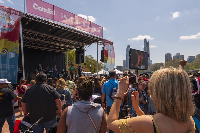 People listening to a band