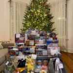 Donated toys under a Christmas tree