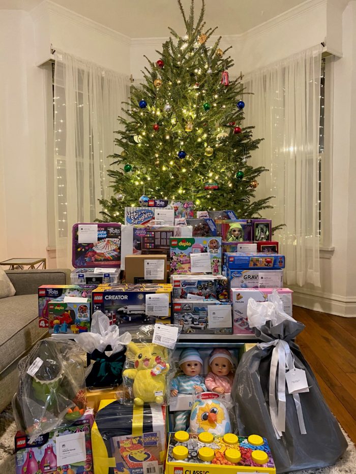 Donated toys under a Christmas tree