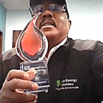 Ramon Hayes posing with Diverse EESP Incubator Production Award
