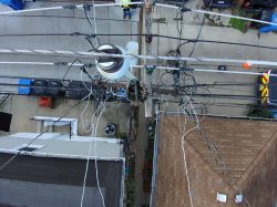 Maintenance Inspector captures photo of pole top with drone