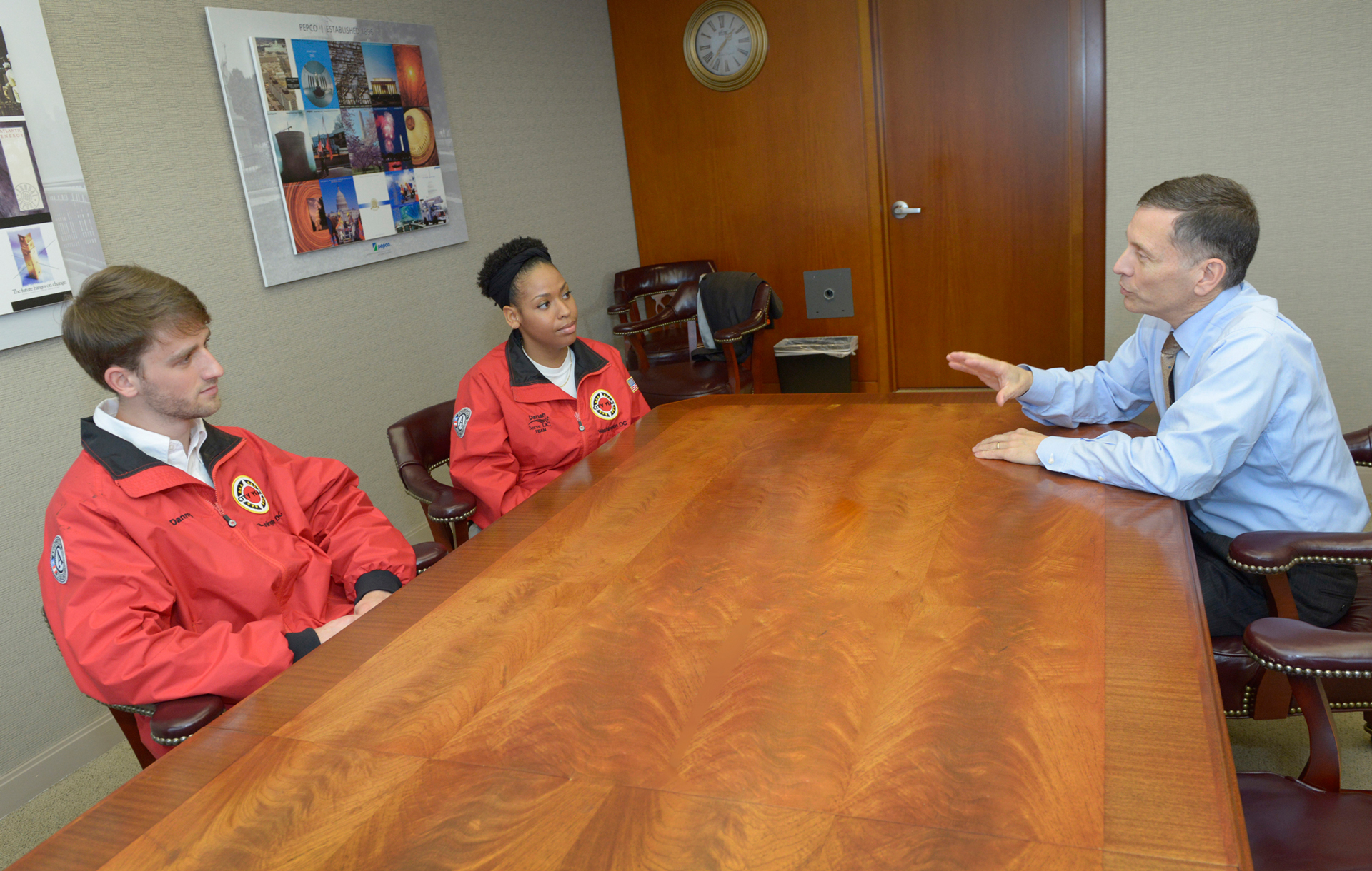 Dave Velazquez speaks with City Year volunteers