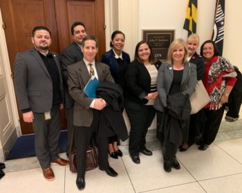 Pepco Employees on Capitol Hill standing in front of Rep. John P. Sarbanes' office.