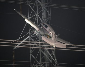 Private plane in a transmission tower